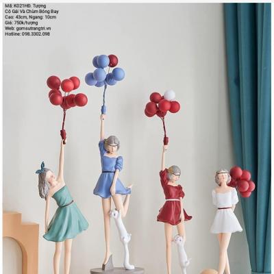 TƯỢNG CÔ GÁI VÀ CHÙM BÓNG BAY